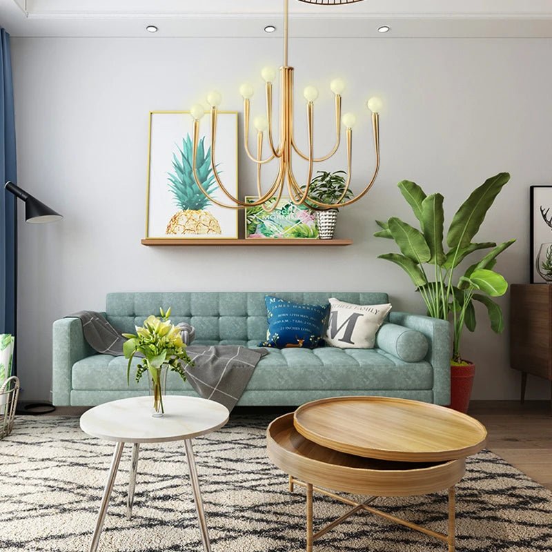 Elegant Noelle Chandelier by Residence Supply featuring multiple glass bulbs and a modern gold finish.