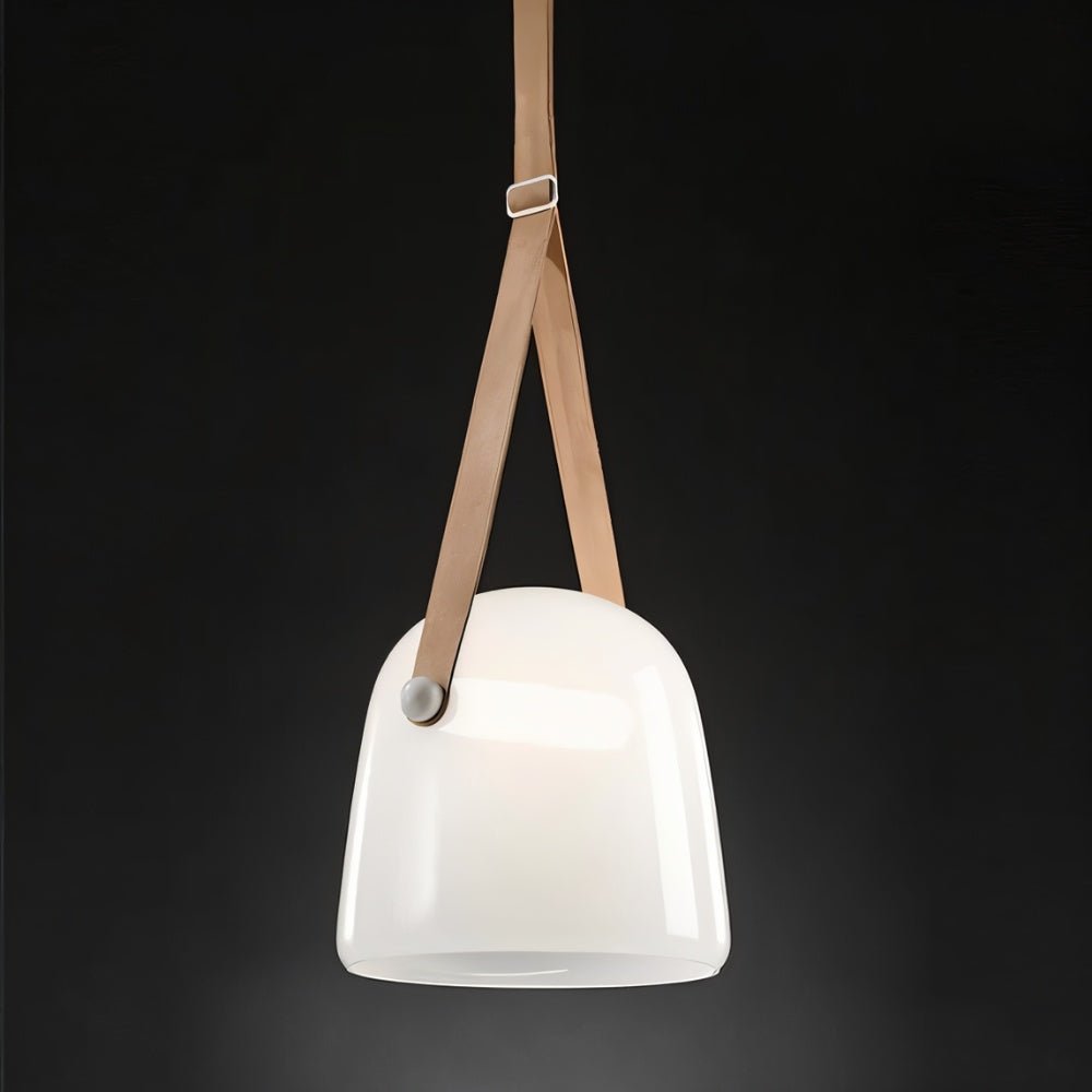 Nola Pendant Light by Residence Supply hanging from ceiling with a modern design and clear glass shade.