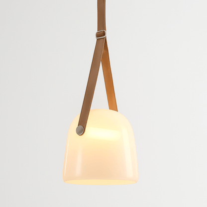 Modern Nola Pendant Light by Residence Supply featuring a sleek metal frame and warm ambient lighting.