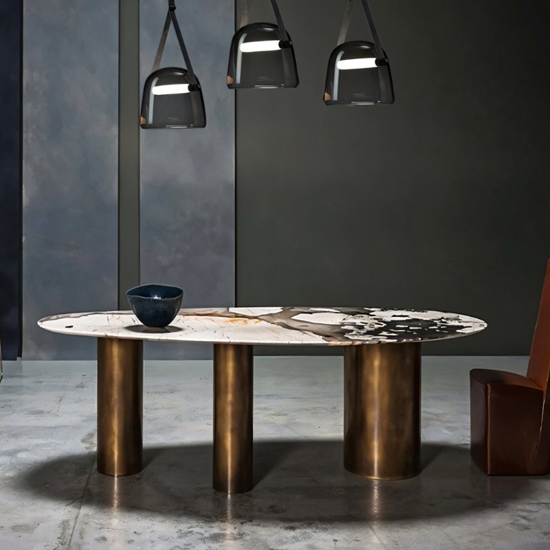 Modern Nola Pendant Light by Residence Supply with a sleek metal finish and clear glass shade hanging from a ceiling mount.