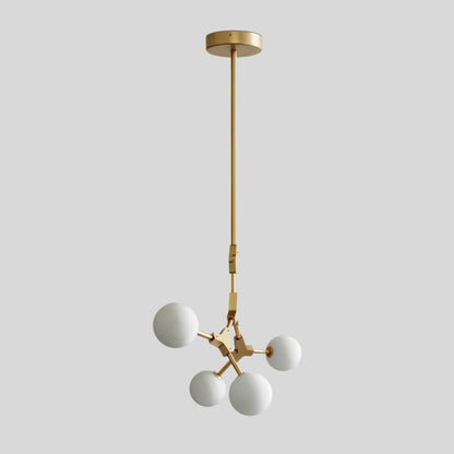 Elegant Noxira chandelier by Residence Supply featuring multiple hanging glass pendants and a sleek modern design.
