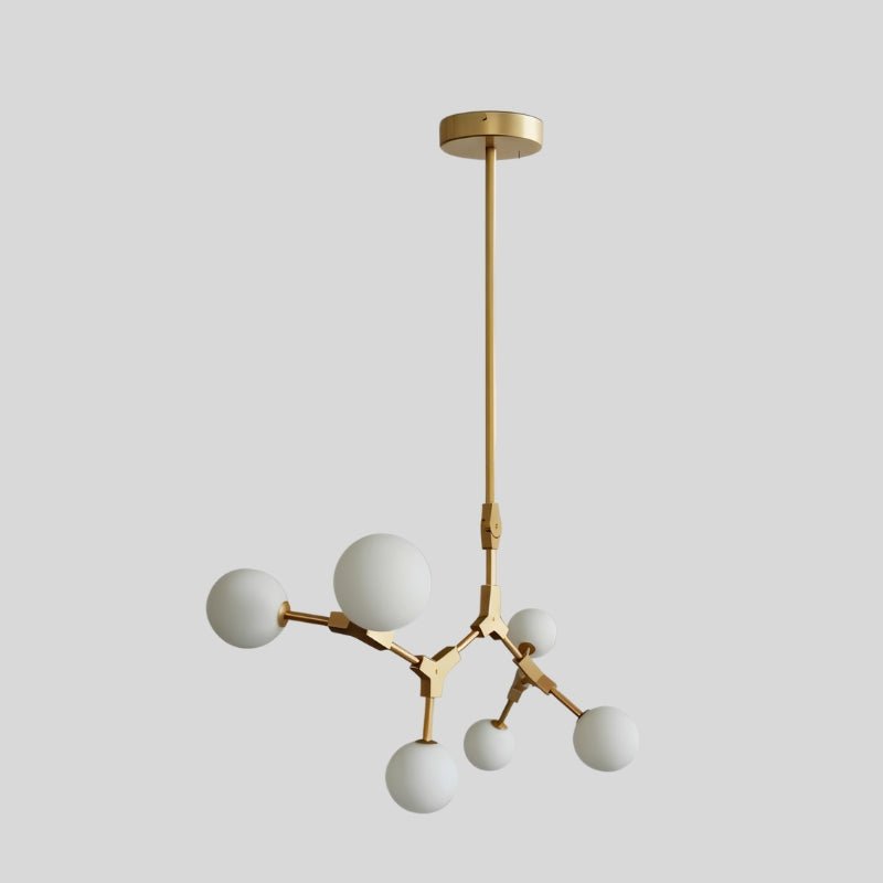 Elegant Noxira chandelier by Residence Supply featuring multiple glass globes and a sleek metal frame for modern lighting.
