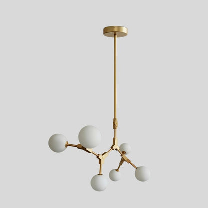Elegant Noxira chandelier by Residence Supply featuring multiple glass globes and a sleek metal frame for modern lighting.