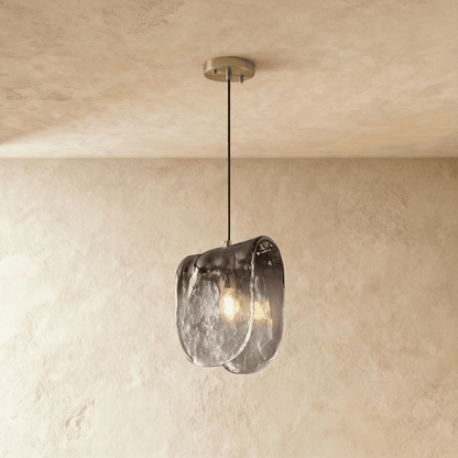 Nuppu Pendant Light by Residence Supply hanging from ceiling with a modern, minimalist design in a neutral color.