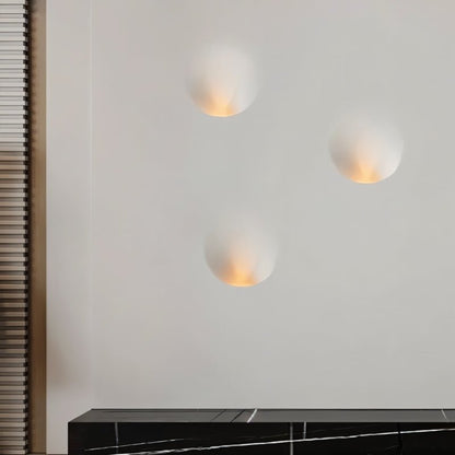 Close-up of Residence Supply Onexa Trimless Wall Light with sleek dome design, showcasing modern wall lighting fixture.