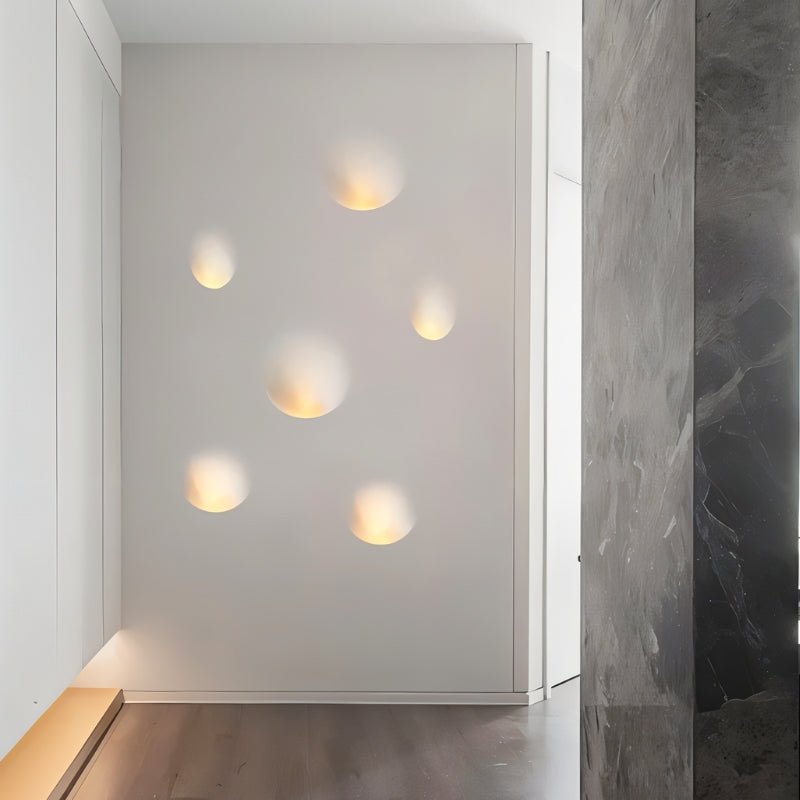 Onexa Trimless Wall Light by Residence Supply with sleek dome design illuminating a hallway wall.