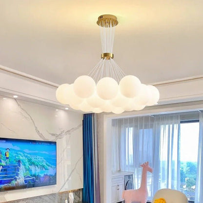 Orbea chandelier by Residence Supply showcasing intricate metal frame and multiple light fixtures hanging elegantly.