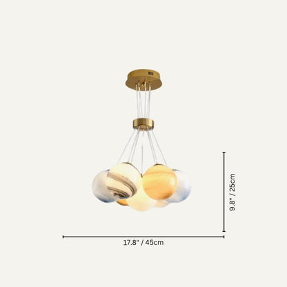 Orbea chandelier by Residence Supply featuring elegant hanging light fixtures with intricate design and warm illumination.