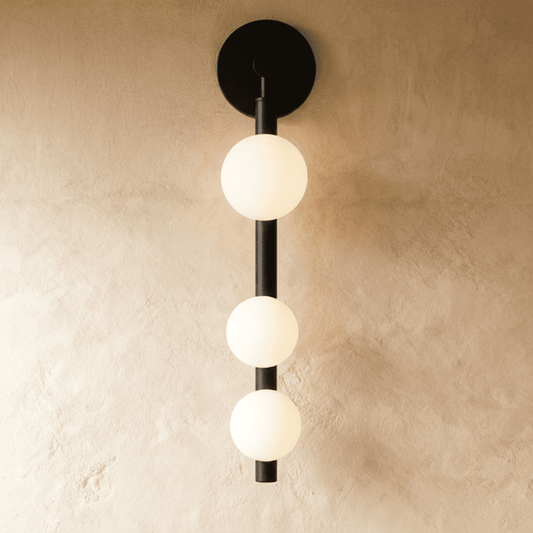 Modern Orbos Wall Lamp by Residence Supply featuring sleek design and ambient lighting for contemporary interiors.