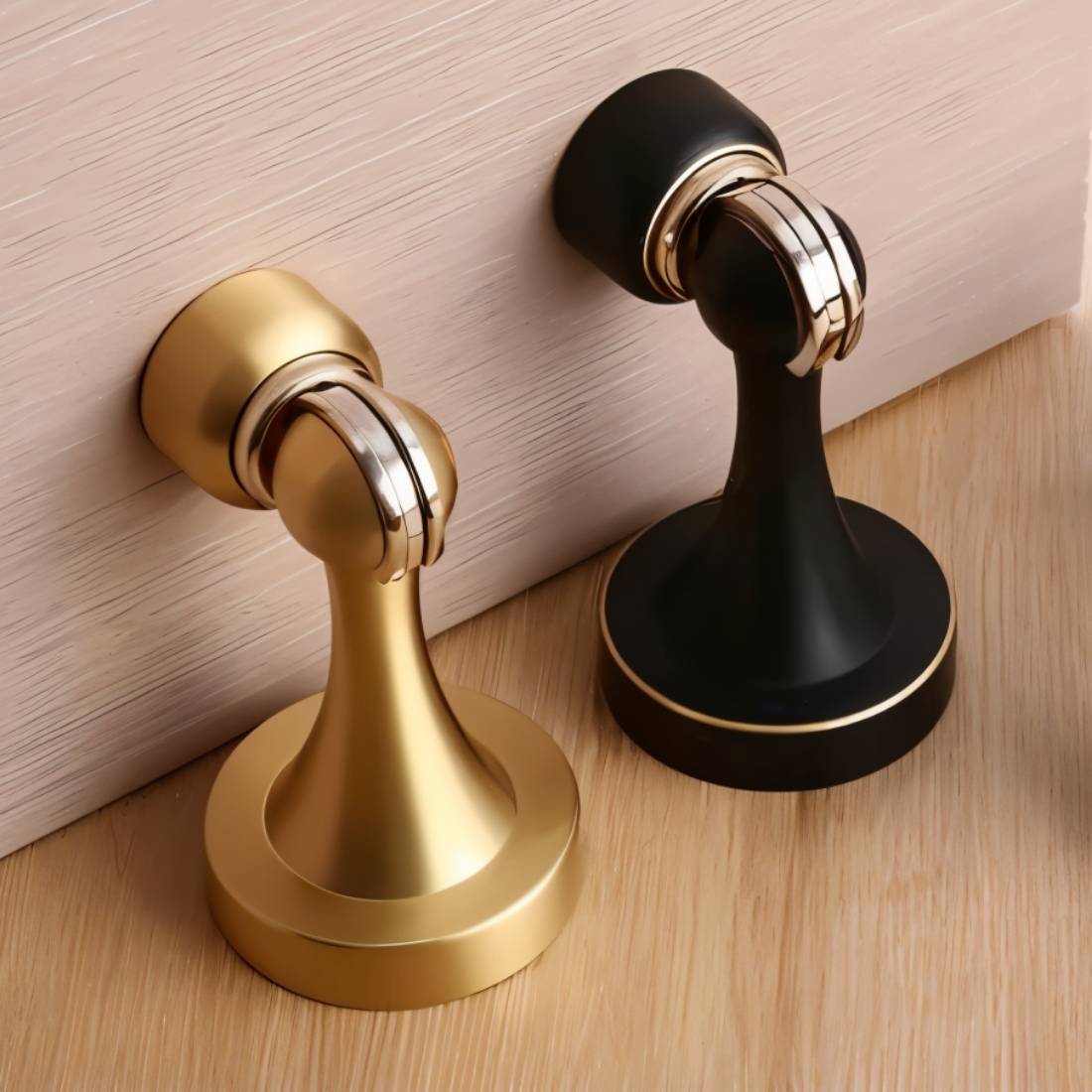 Residence Supply Osta Door Stop, a metal door hardware piece for preventing door movement, shown in a close-up image.