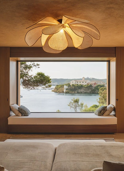 Elegant Pankh ceiling light by Residence Supply featuring intricate feather-inspired metal design for stylish interior illumination.