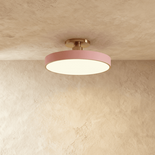 Pentra Ceiling Light by Residence Supply featuring a sleek modern design with a round frosted glass shade and metal finish.