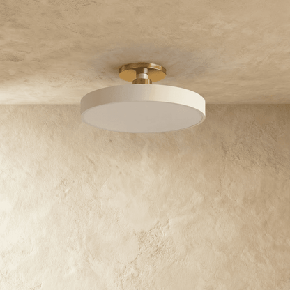 Pentra ceiling light by Residence Supply with sleek modern design and diffused LED illumination for living spaces.