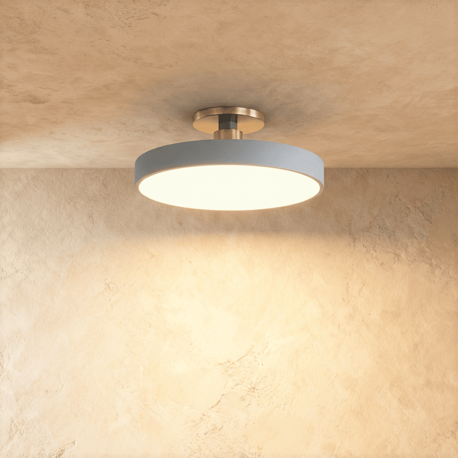 Modern Pentra ceiling light by Residence Supply with a sleek metal finish and ambient lighting for living rooms or hallways.