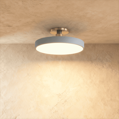 Modern Pentra ceiling light by Residence Supply with a sleek metal finish and ambient lighting for living rooms or hallways.