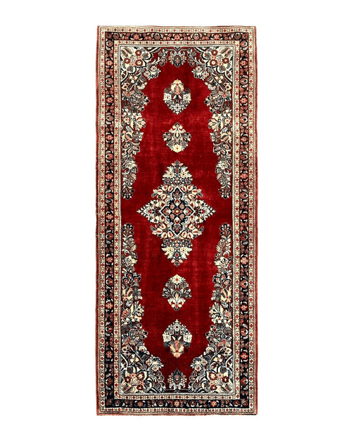 Handmade Persian Sarouk runner rug, 2.7x6 ft, red wool Oriental carpet with semi-open field, vintage semi-antique style.