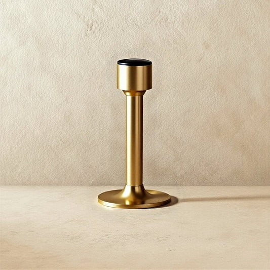 Open-box Pesu door stop by Residence Supply, mounted on door to prevent movement, in a home hardware setting.