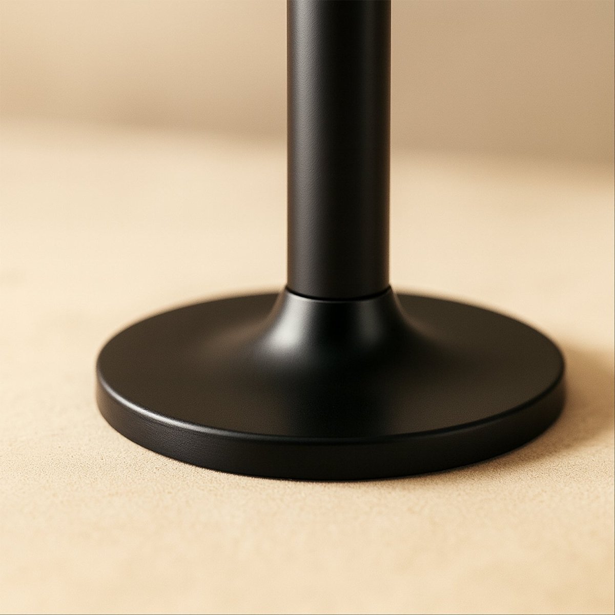 Open-box Pesu door stop from Residence Supply, metal door hardware designed to prevent door movement.