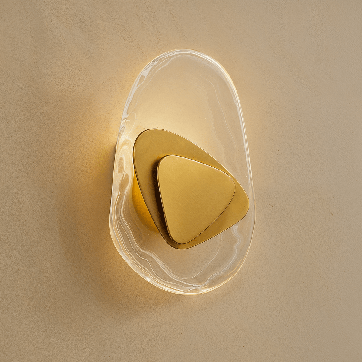 Residence Supply Petra wall lamp featuring a sleek modern design with a brass finish and minimalist wall mounting.