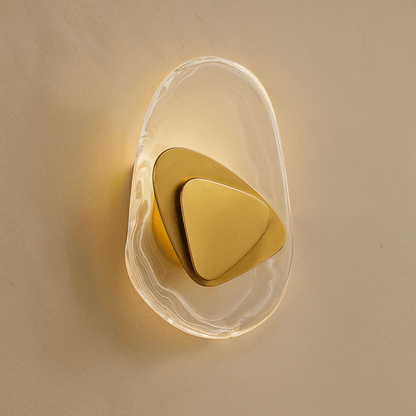 Residence Supply Petra wall lamp featuring a sleek modern design with a brass finish and minimalist wall mounting.