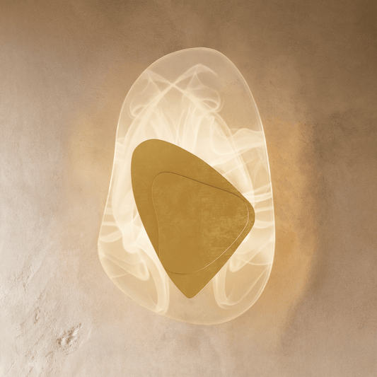 Residence Supply Petra Wall Lamp with sleek modern design and metal finish, mounted on a wall for ambient lighting.