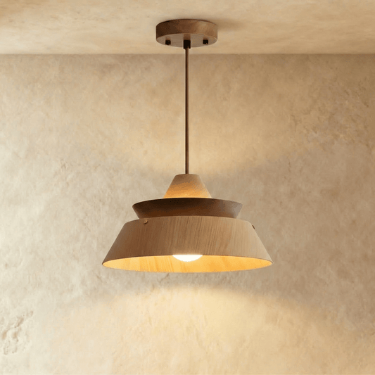 Phaos Pendant Light by Residence Supply hanging from ceiling with sleek modern design in a contemporary interior setting.
