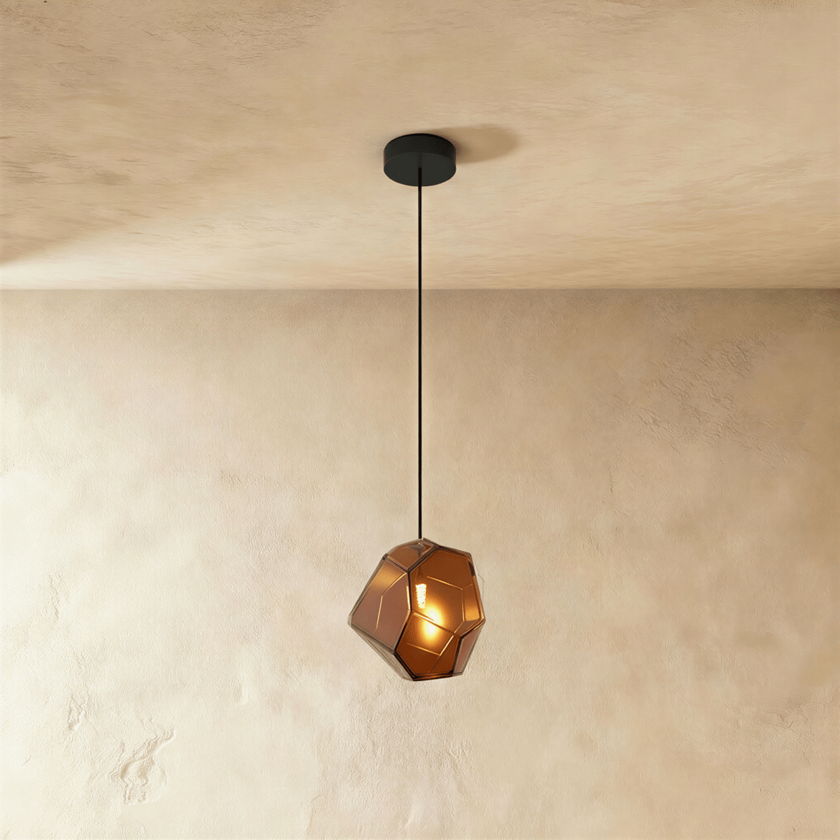 Residence Supply Piedra Pendant Light hanging fixture with textured stone-like finish and modern design.