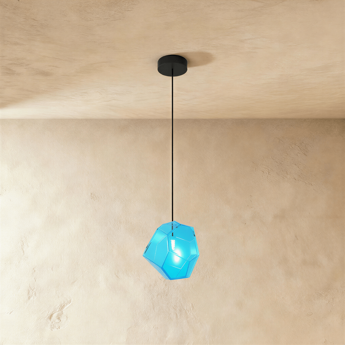 Residence Supply Piedra Pendant Light hanging fixture with a textured stone-like design and modern style.