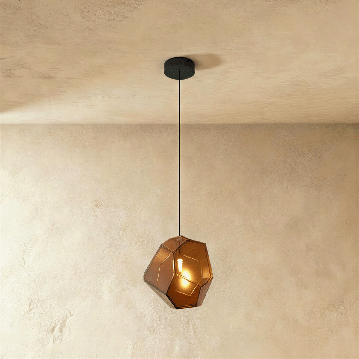 Residence Supply Piedra pendant light with a sleek, modern design featuring a smooth stone-like finish and hanging cord.