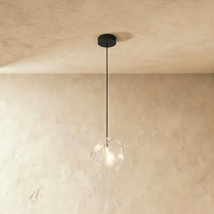 Residence Supply Piedra Pendant Light hanging fixture with a sleek, modern design and a textured stone-like finish.
