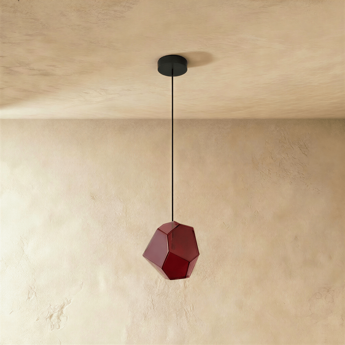Residence Supply Piedra Pendant Light hanging fixture with a sleek, modern design and textured stone finish.