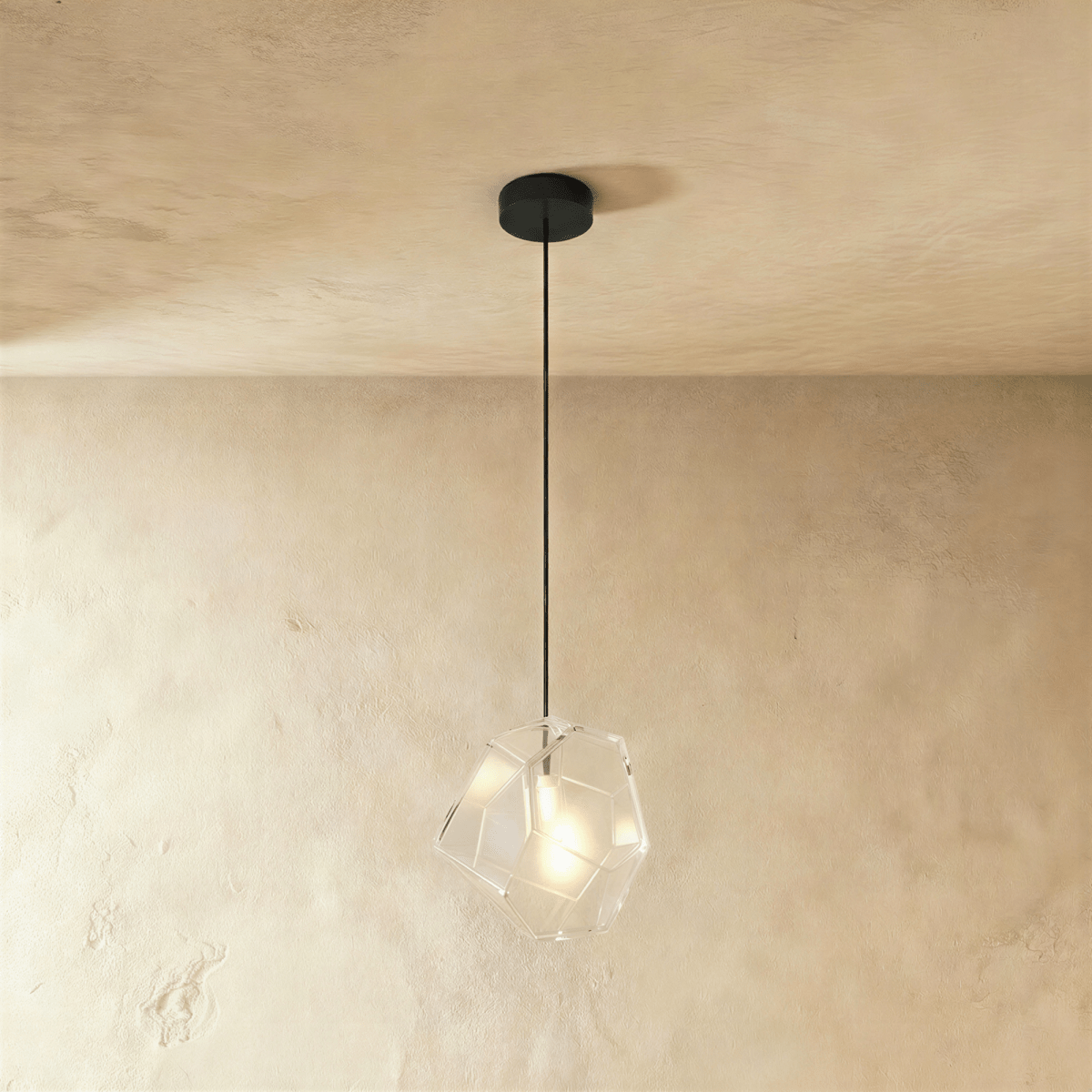 Residence Supply Piedra Pendant Light hanging fixture with a sleek, modern design, featuring a smooth stone-like finish.