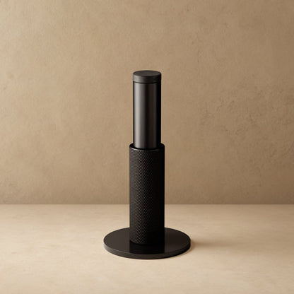 Residence Supply Plint Door Stop securing a door, made of durable material, with a sleek design to prevent door movement.