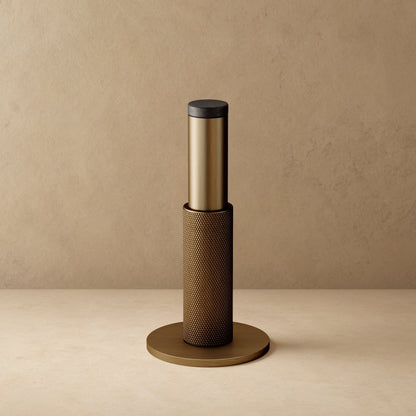 Residence Supply Plint Door Stop securing a door, made of durable material with a sleek design to prevent door movement.