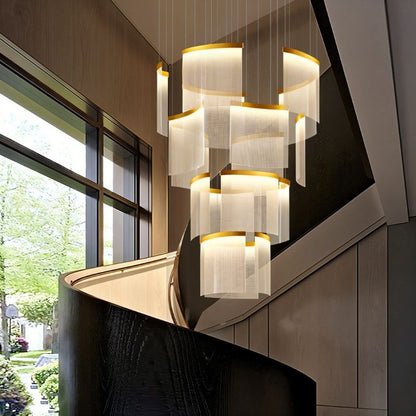 Primus chandelier by Residence Supply featuring a modern, multi-arm design with glass and metal accents for elegant ceiling lighting.