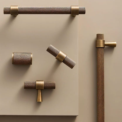 Brass Qaris Pull Bar with knurled design, ideal for cabinet handles in home and garden hardware applications.