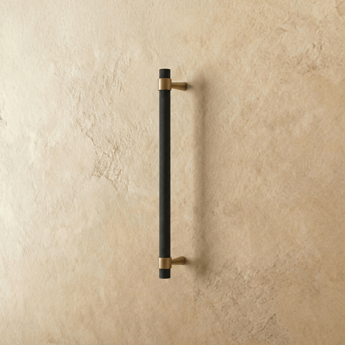 Qaris Pull Bar from Residence Supply, a sleek metal cabinet knob for home and garden furniture, mounted on a cabinet door.
