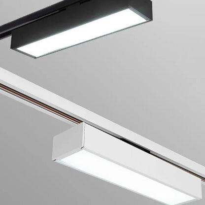Residence Supply Quinn Track Light System with adjustable spotlights mounted on a sleek black track for modern accent lighting.