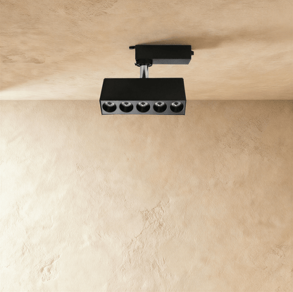 Residence Supply Quinn Track Light System with adjustable spotlights on a sleek track lighting fixture.