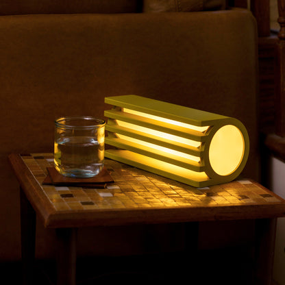 Terra Labs Radiator Table Lamp with mustard-colored shade and sleek design, perfect for modern living spaces.