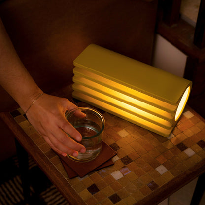 Terra Labs Radiator Table Lamp with mustard-colored shade and modern design, ideal as a stylish accent light for living spaces.