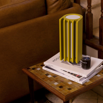 Terra Labs radiator-shaped mustard yellow table lamp with a sleek design, ideal for modern home decor.