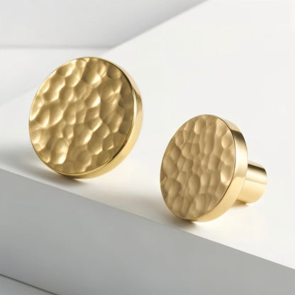 Pair of hammered brass Remy knob and pull bar for cabinet hardware, Residence Supply, with a textured finish and classic design.
