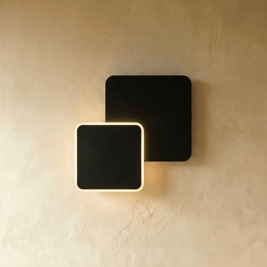 Renley Wall Lamp by Residence Supply, featuring a modern design with a sleek metal finish and adjustable arm for versatile lighting.