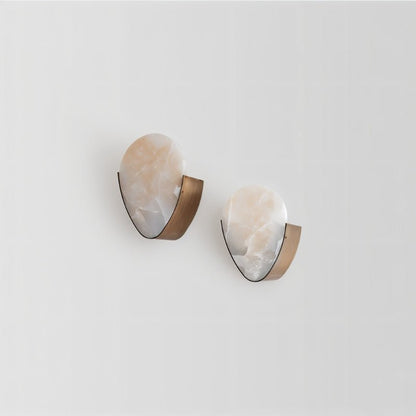 Elegant Ritu Alabaster Wall Sconce by Residence Supply featuring a smooth alabaster glass shade and metallic mounting.