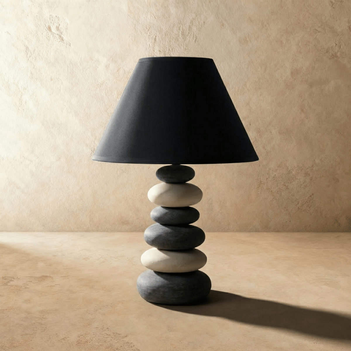 Residence Supply Rocky table lamp featuring a textured, rocky design with a sleek base and a fabric lampshade.