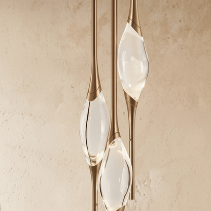 Romilly Pendant Light by Residence Supply featuring a sleek modern design with a metal finish and adjustable hanging cords.