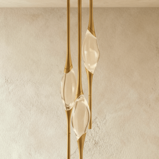 Romilly Pendant Light by Residence Supply featuring a sleek modern design with a metal finish and clear glass shade.
