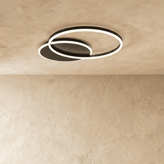 Elegant Roshan ceiling light by Residence Supply featuring a modern design with a sleek metal finish and ambient lighting.