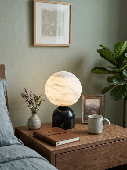 Round alabaster marble table lamp by Korewolamp with a smooth, spherical design and warm, natural stone finish.